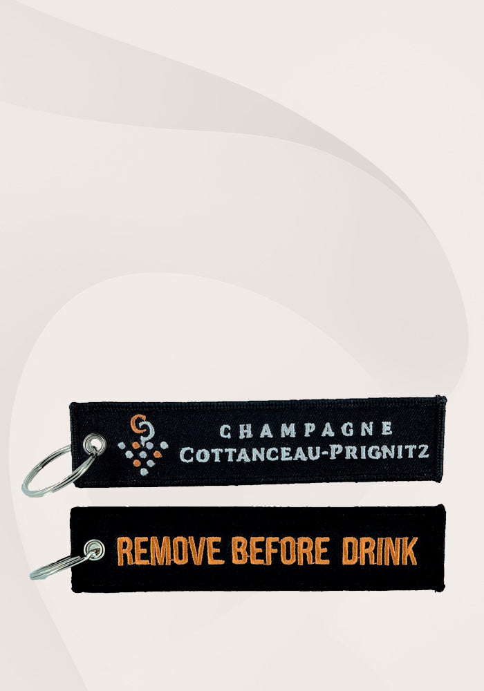 Porte-clé "Remove Before Drink"